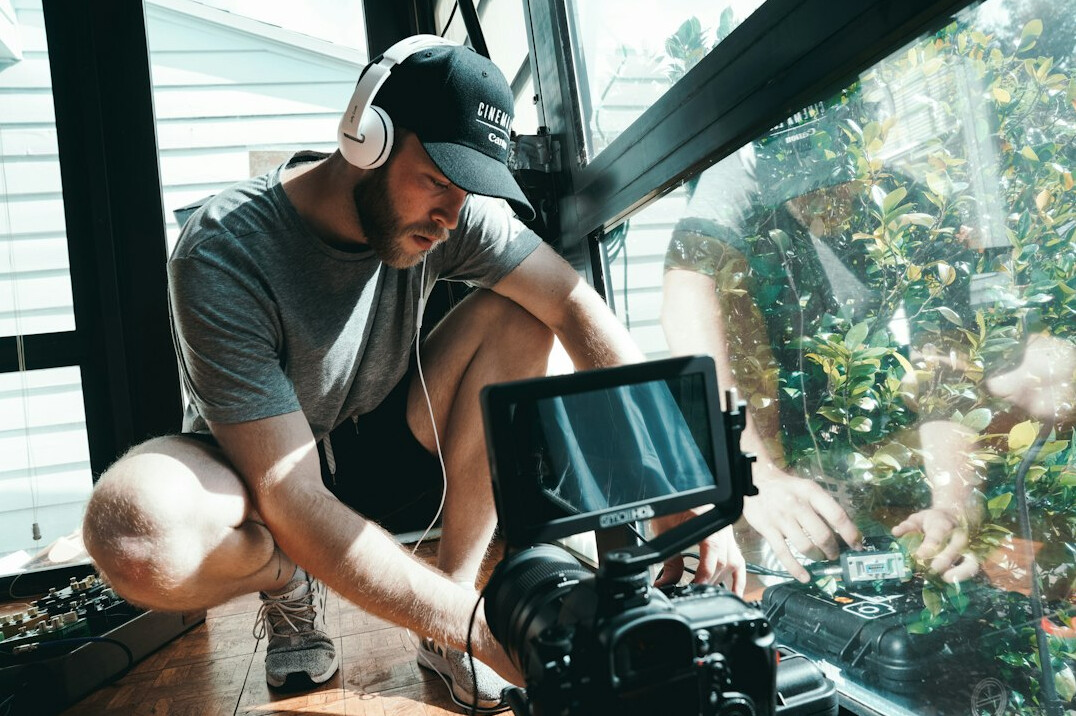 filmmaker reviewing cut on monitor