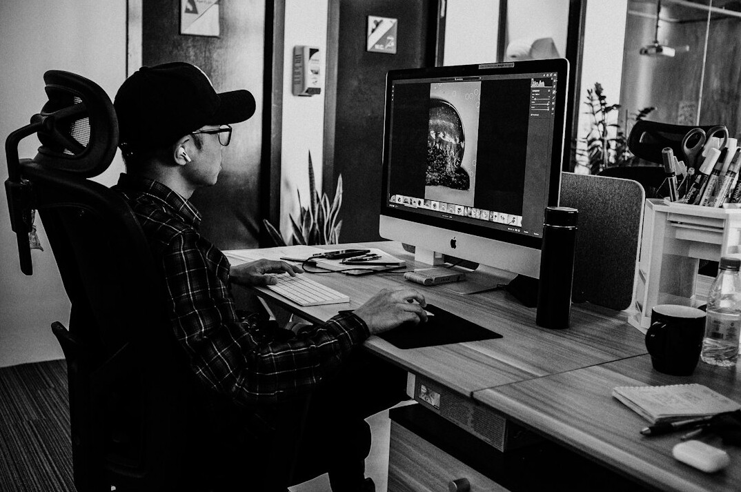 professional video editor at desk