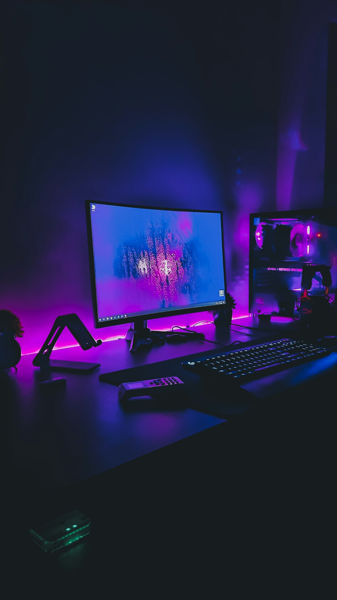 Video editing workstation with multiple monitors showing a colour-graded timeline